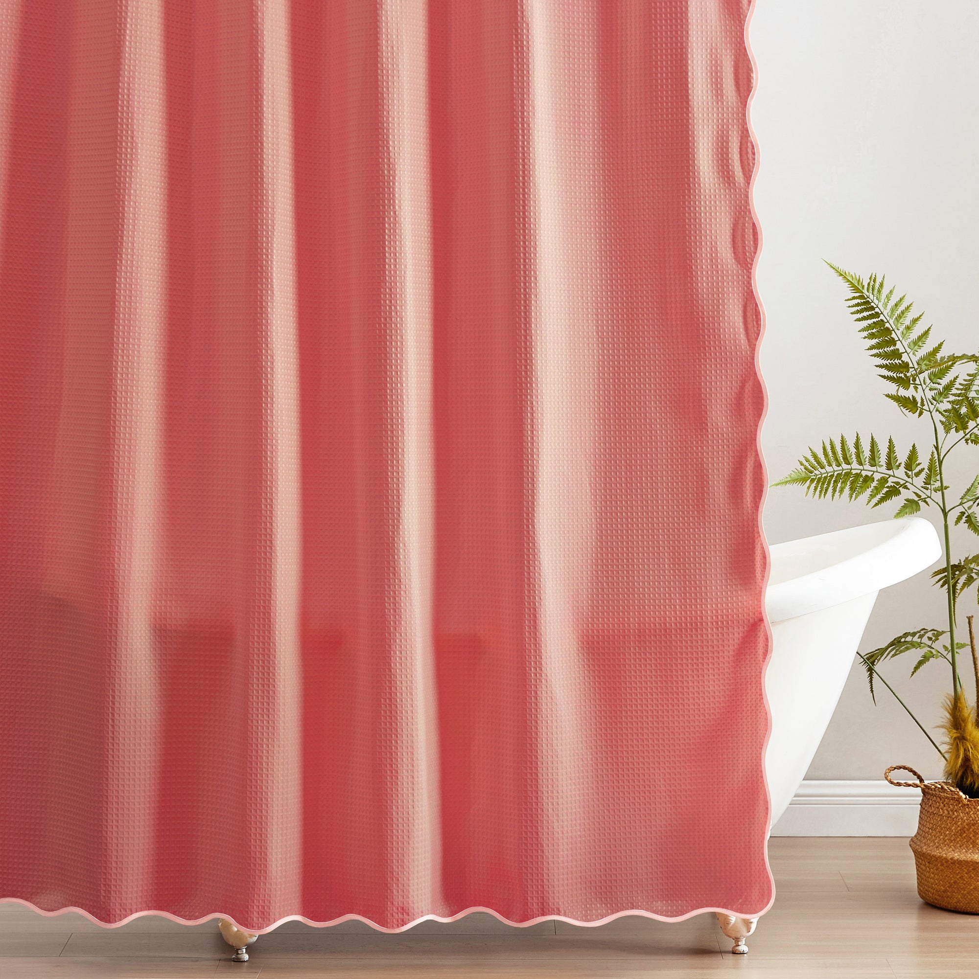Pink textured curtain with a plant in the corner