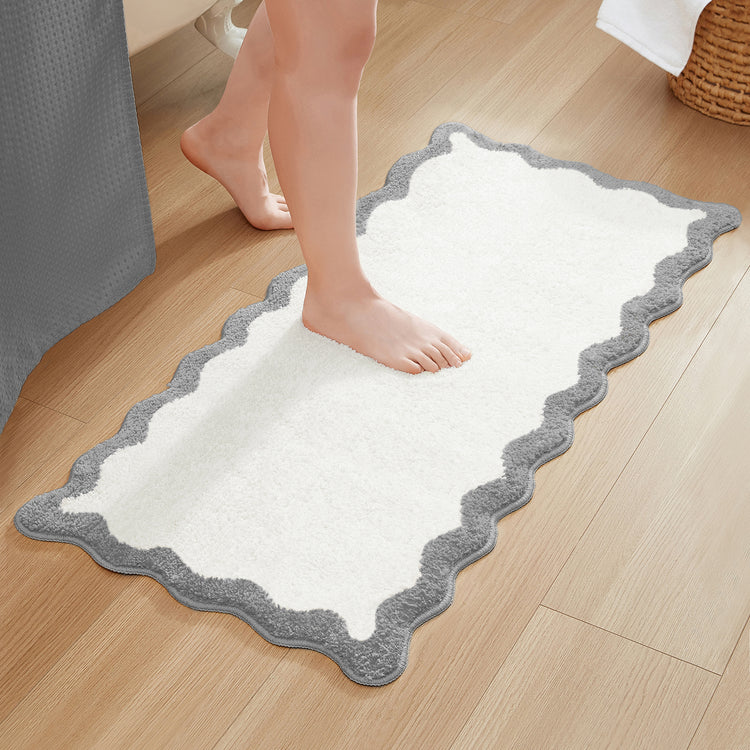 bath mat gray white scalloped wavy edge