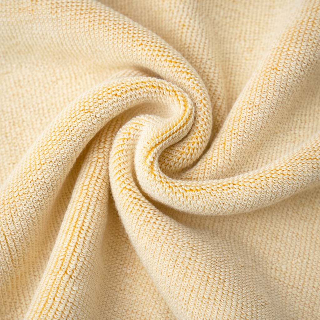 Close-up of beige textured fabric
