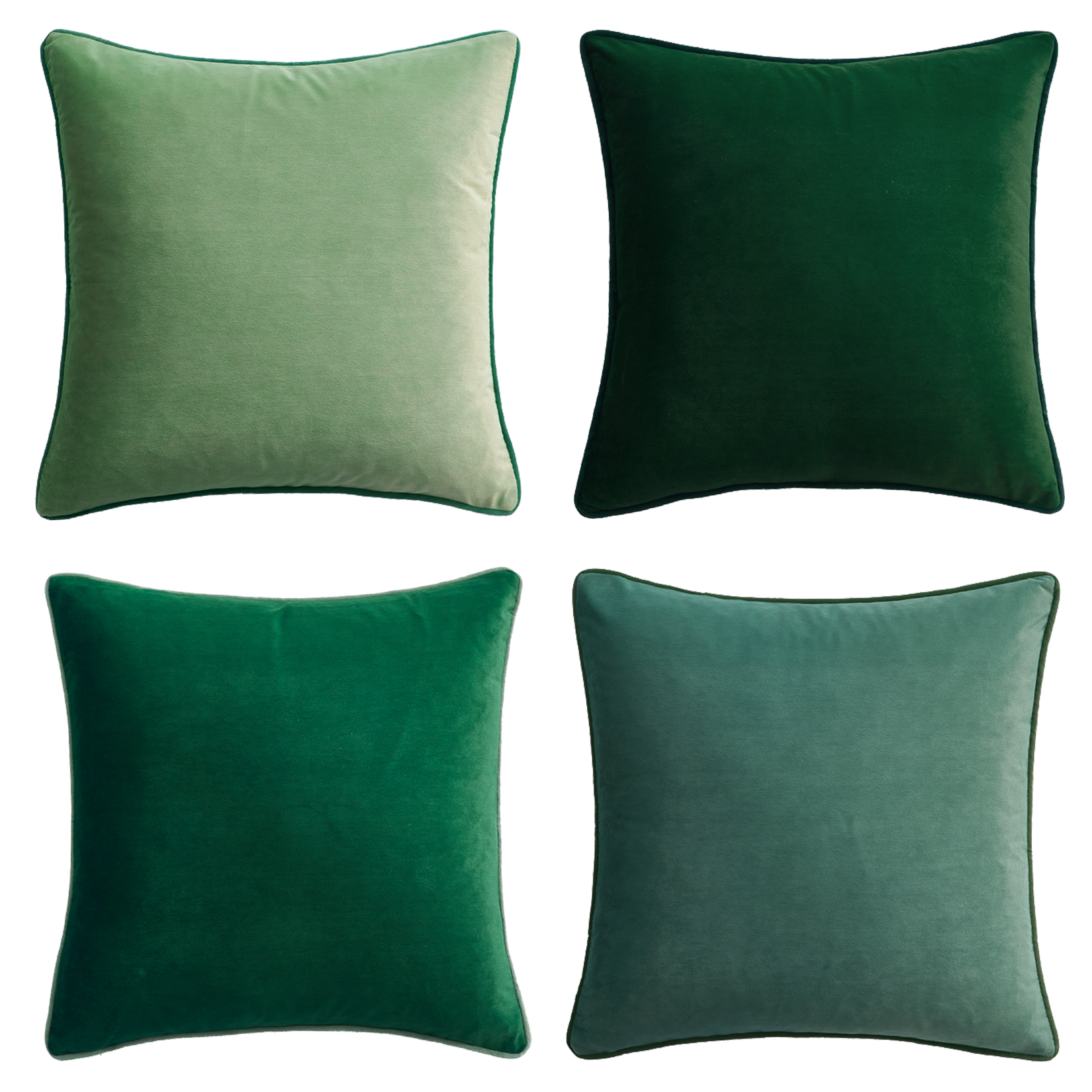 Four green pillows of different shades on a white background