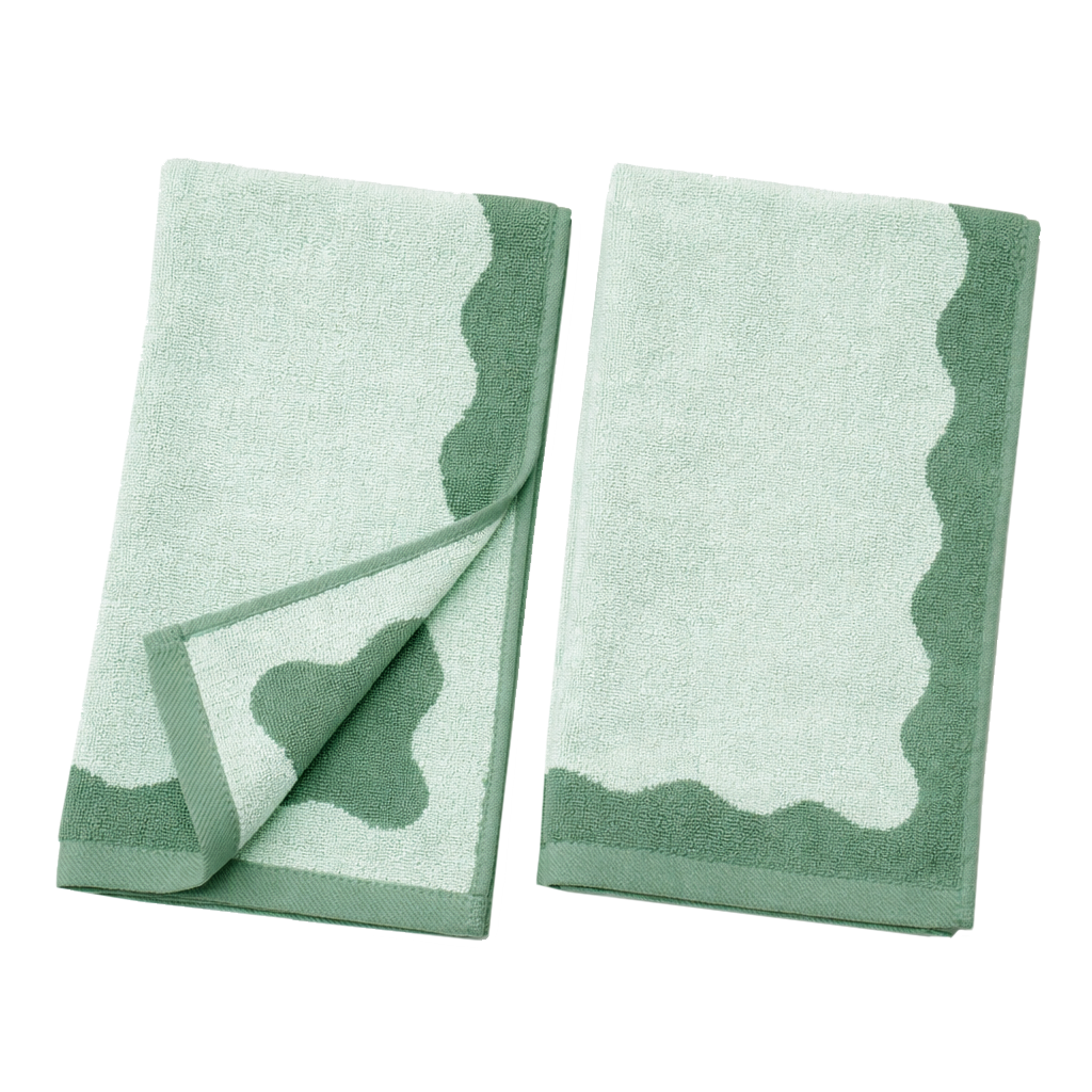 Two green and white patterned towels on a white background