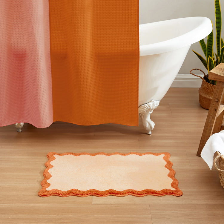 bath mat orange scalloped wavy edge