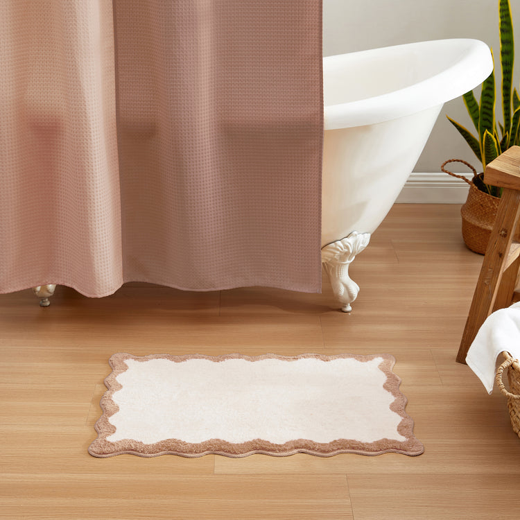 bath mat beige scalloped wavy edge