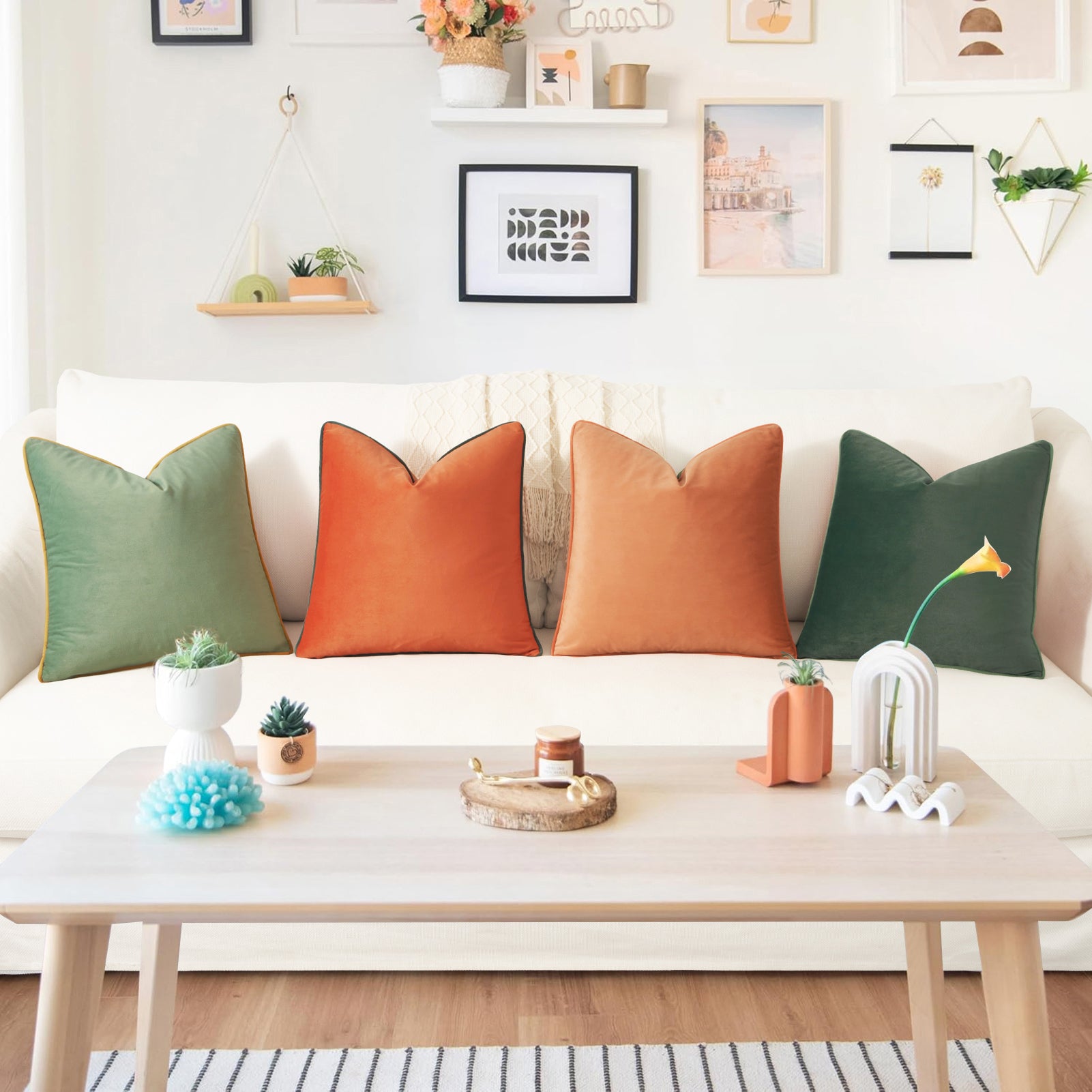 Living room with a white sofa featuring colorful pillows, a wooden coffee table, and decorative items.