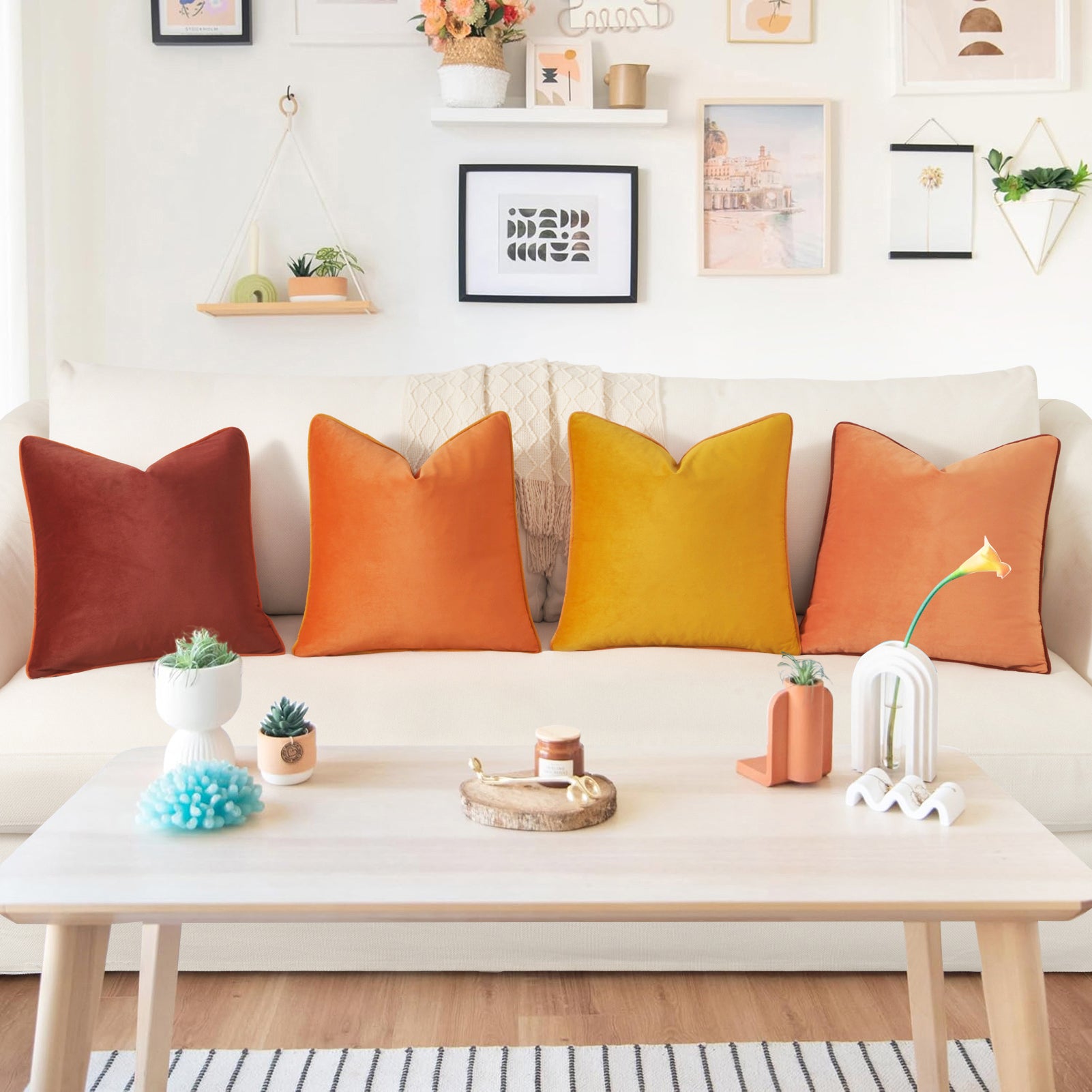 Colorful pillows on a sofa in a living room with a coffee table and decor items.