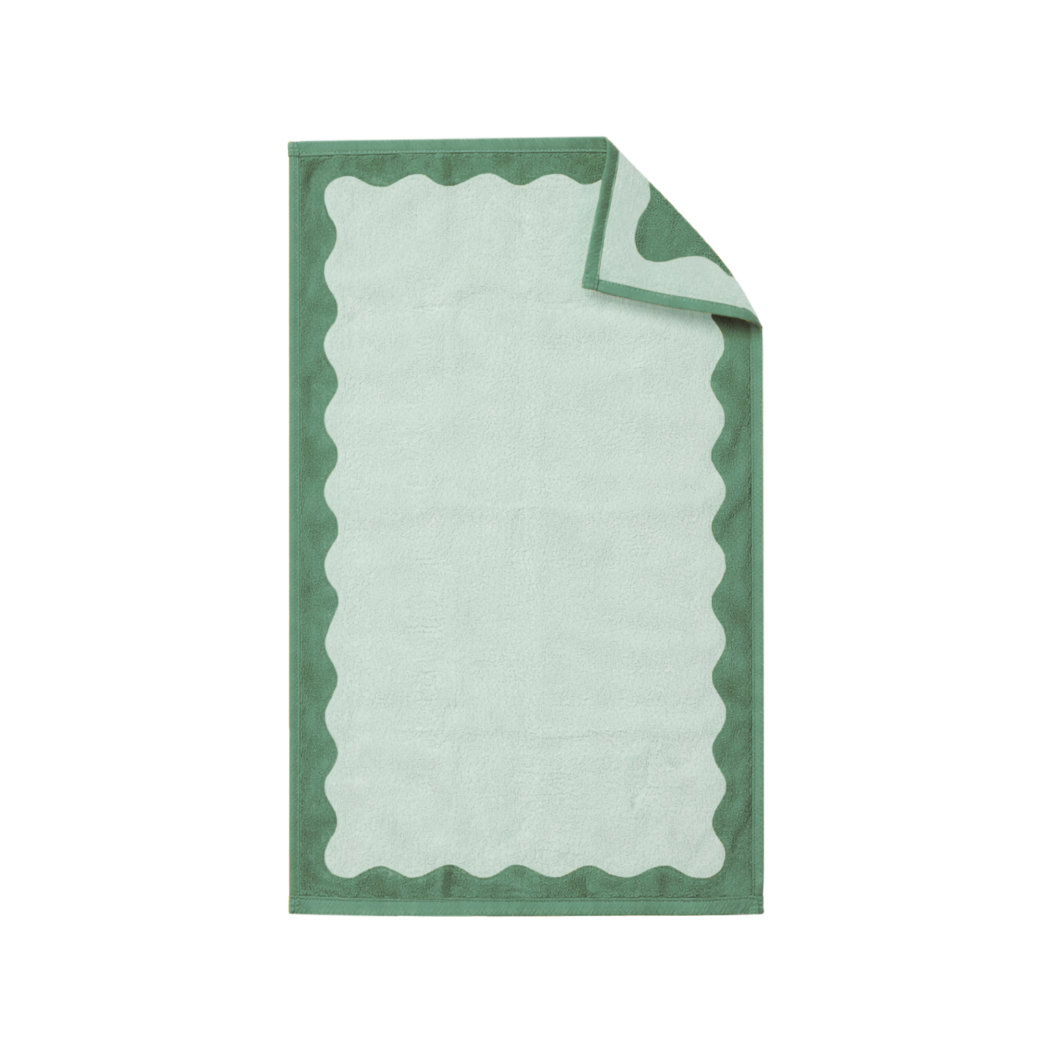 Green and white towel with scalloped edge on a white background