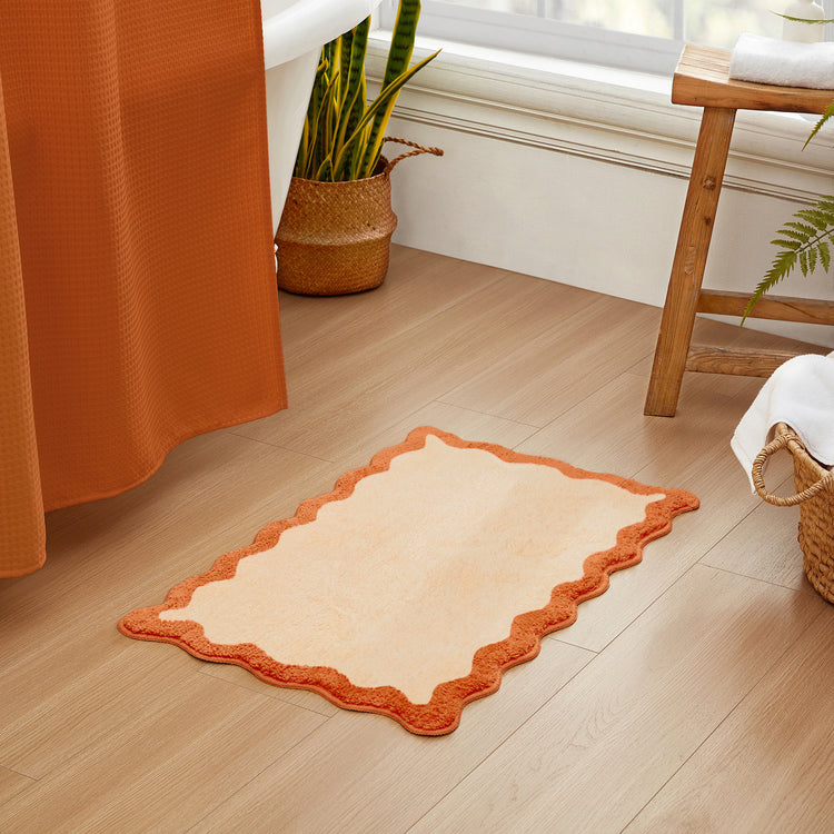 bath mat orange scalloped wavy edge