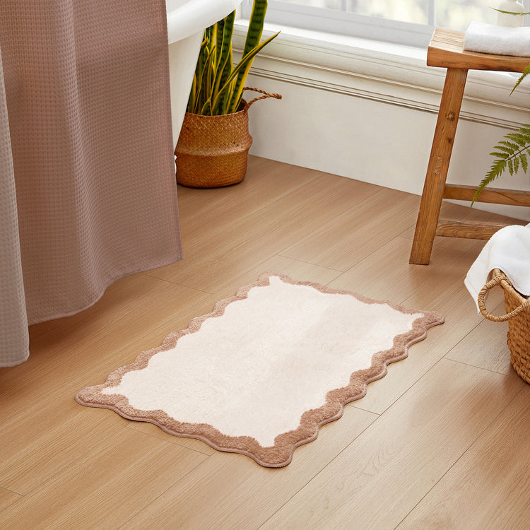 bath mat beige scalloped wavy edge