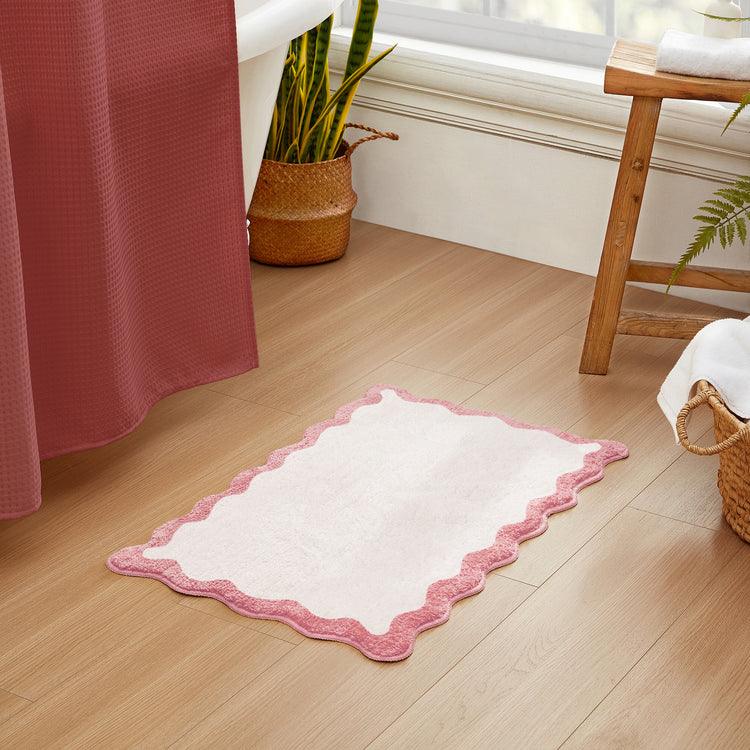 bath mat pink scalloped wavy edge