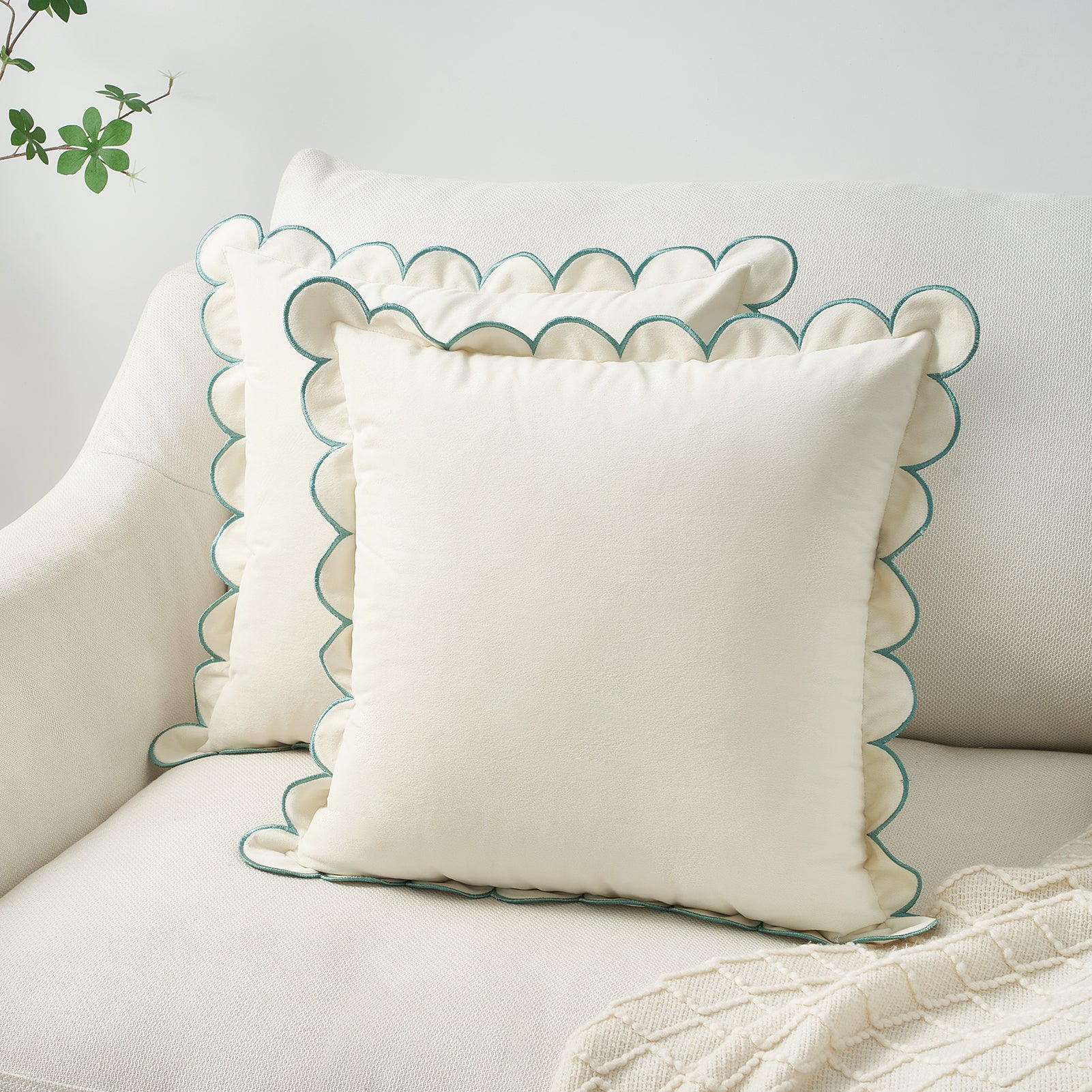 Decorative pillow with scalloped edge on a sofa