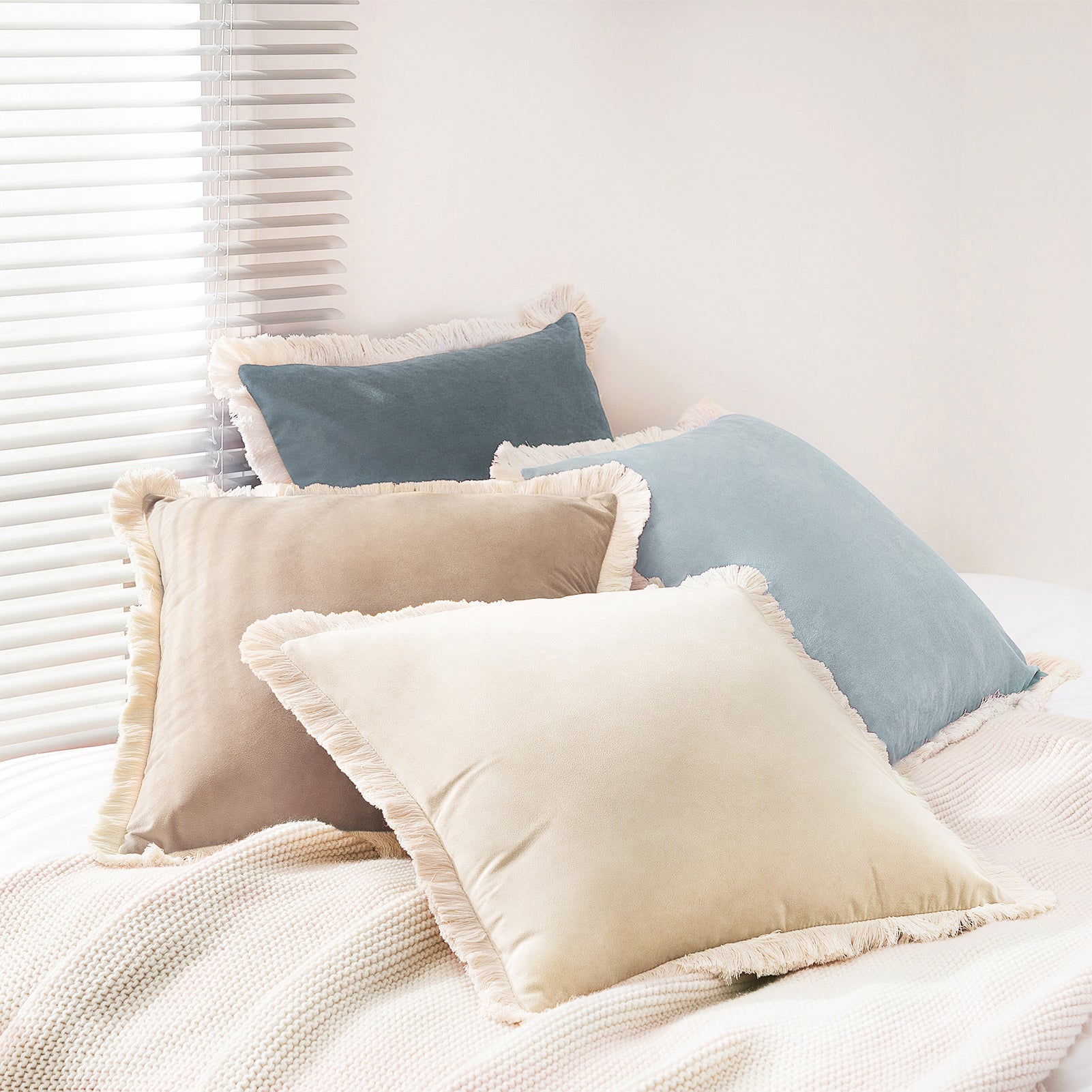 set of four velvet decorative throw pillow covers with natural cotton fringe border