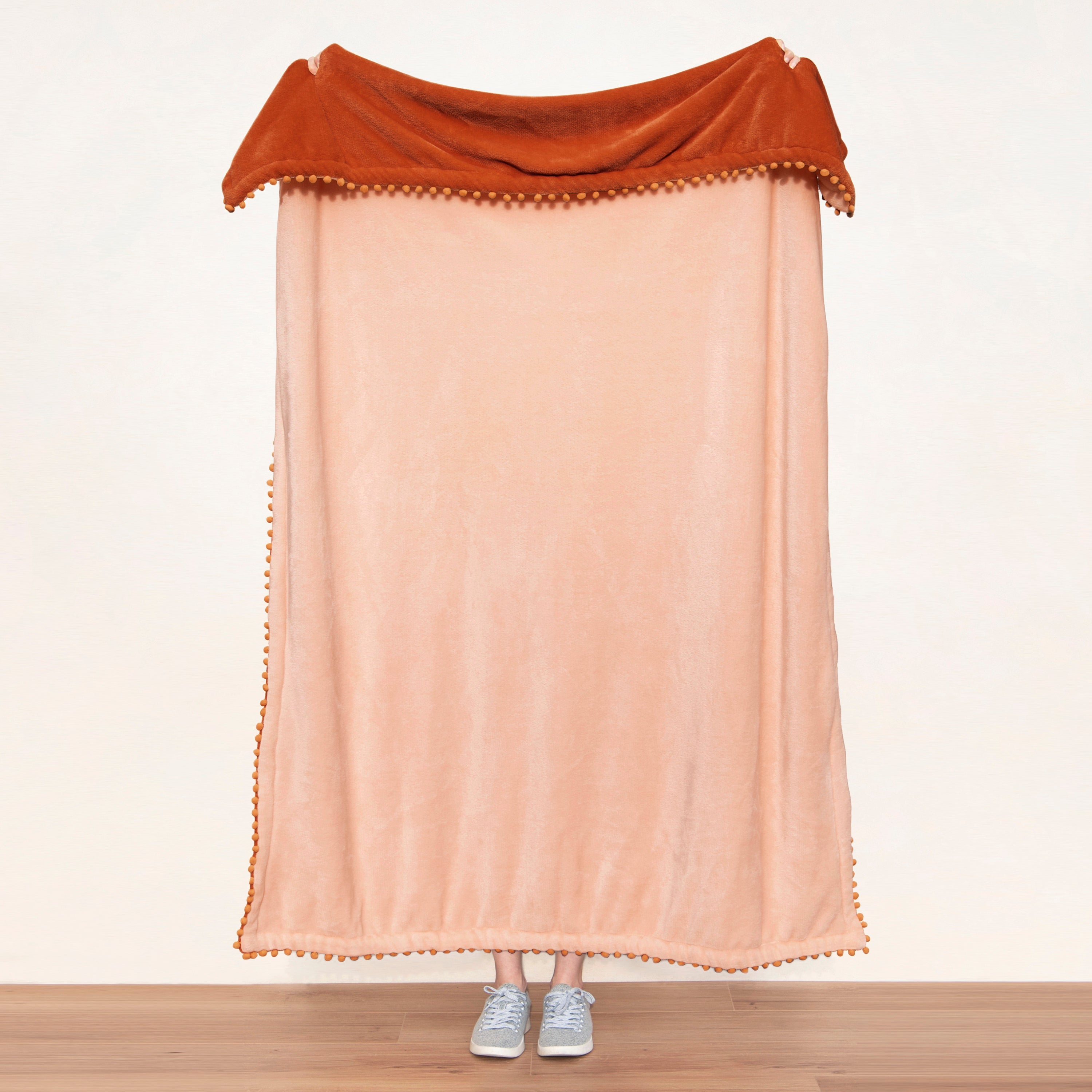 decorative throw blanket pom pom fringe edge reversible design burnt orange light orange