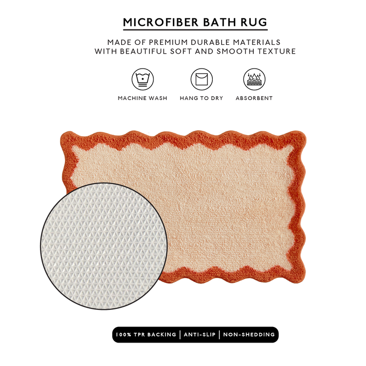 Microfiber bath rug with red border on a white background, featuring text about material and care.
