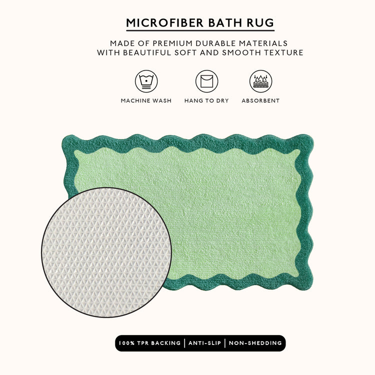 Green microfiber bath rug with text on a white background