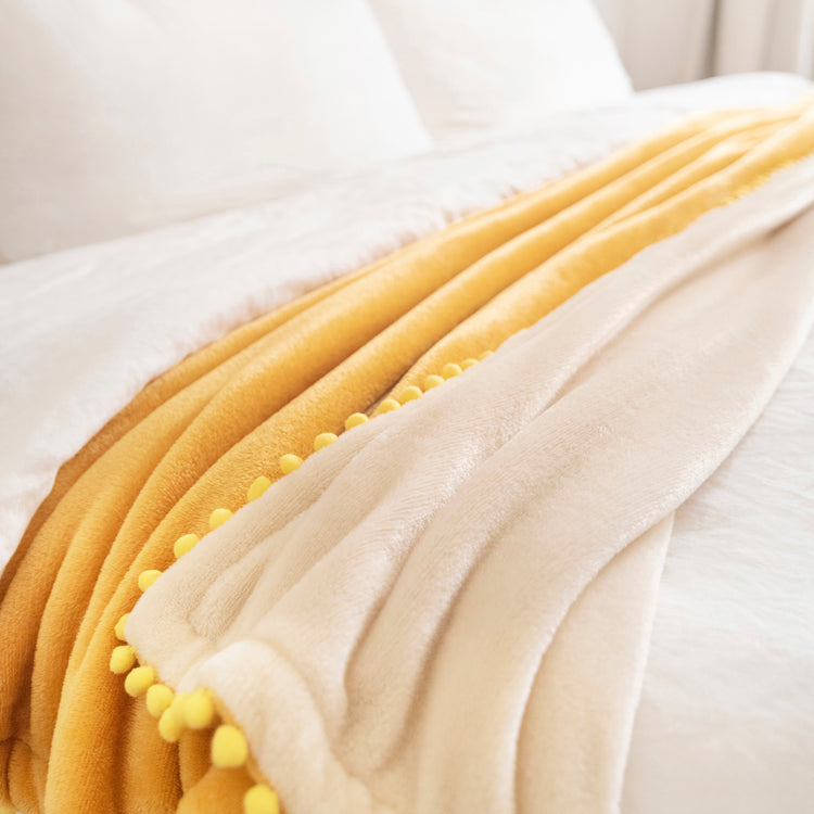 decorative throw blanket microfiber soft pom pom yellow beige